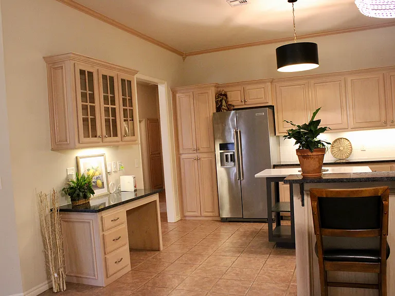 Kitchen with island and stainless steel appliances