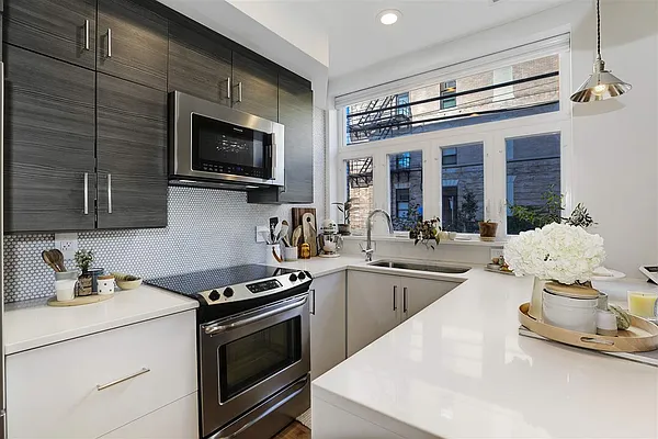 Sold by Keller Williams City Life Realty | media 14