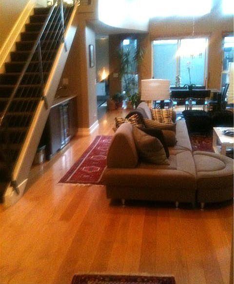 huge main floor great room with hardwoods, 1/2 bath, laundry