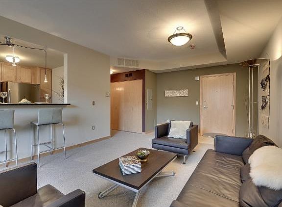 Livingroom/Entry with closet and access to guest bathroom