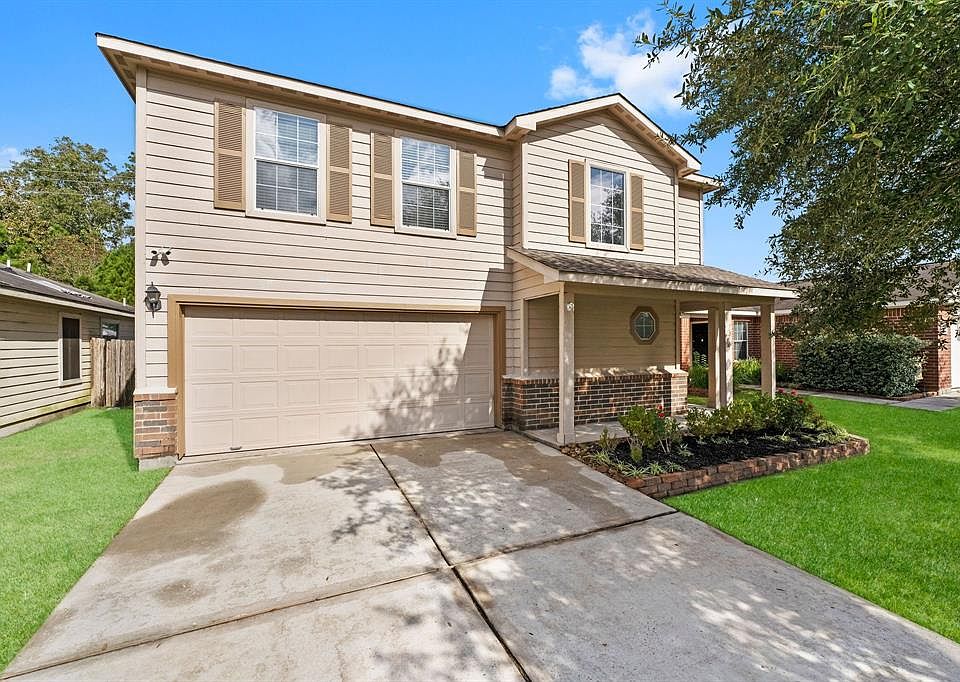 Welcome home to 29002 Village Creek Loop!