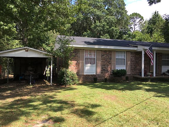 Front view including carport