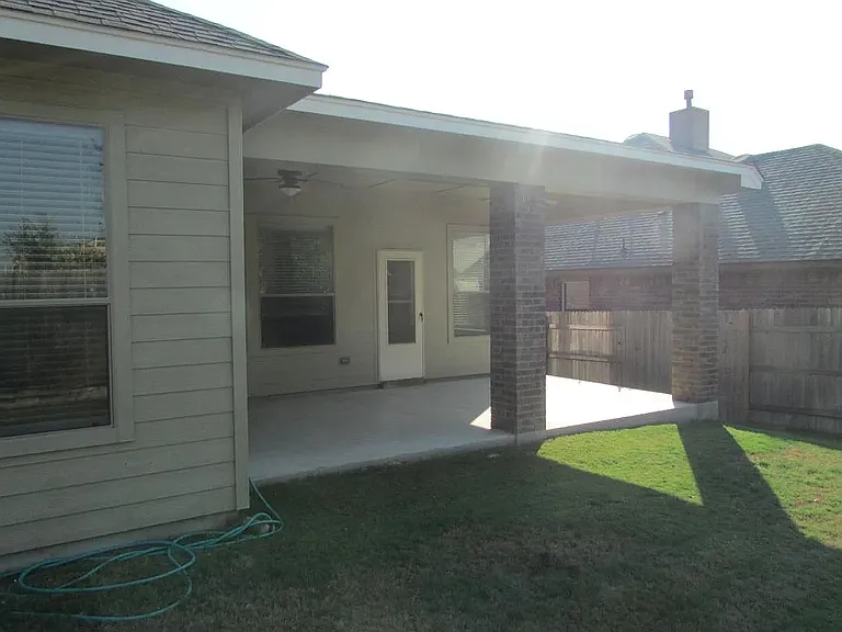 back yard and covered patio