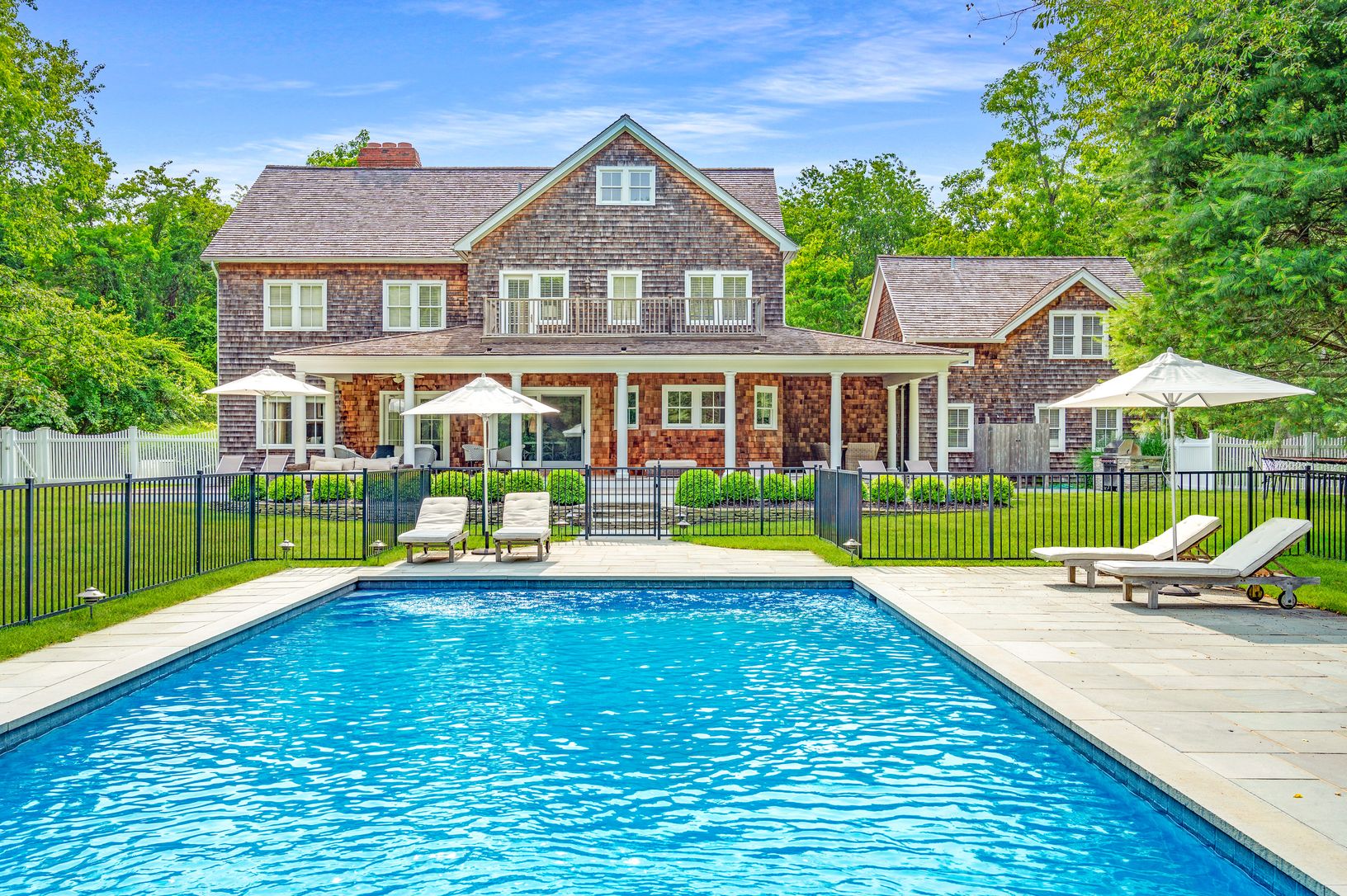  Back of home with pool