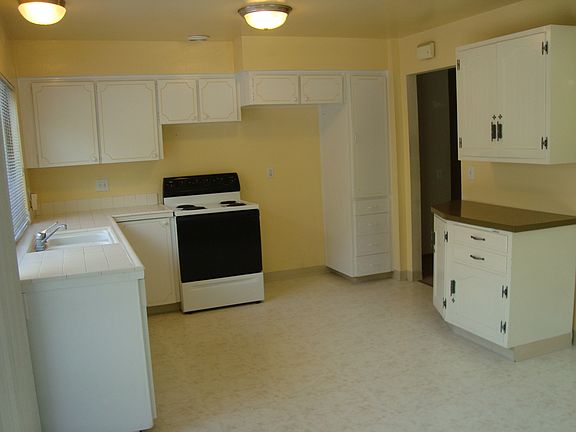 Kitchen full of windows and space