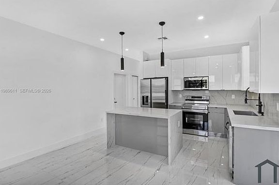 5th image of 5043 Benton St