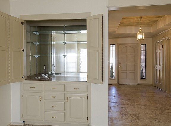 Stunning hide away wet bar