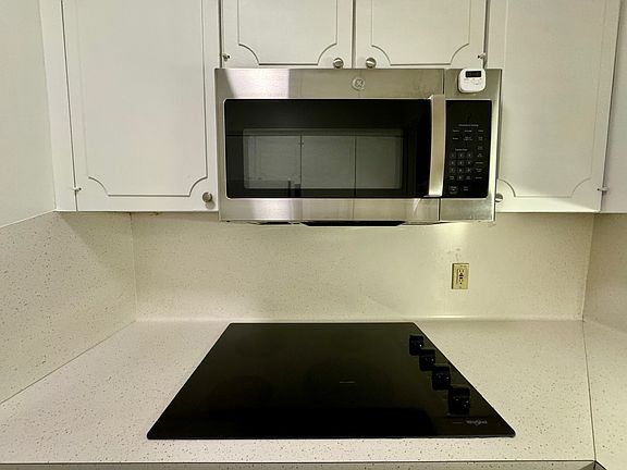 Microwave and glass top electric range