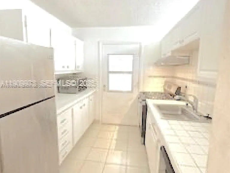 20120 NE 2nd Ave #W27 — Photo 15