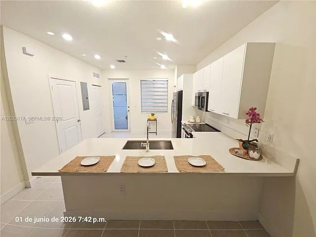 6453 NW 102nd Path #103 — Photo 13
