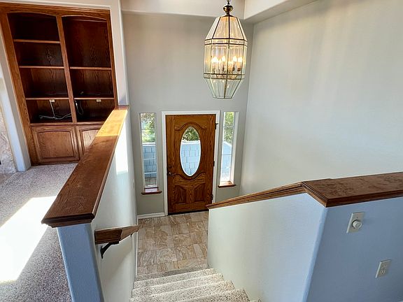 Looking down to entrance from main living level.