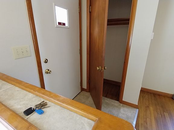 Pony wall and closet in living room