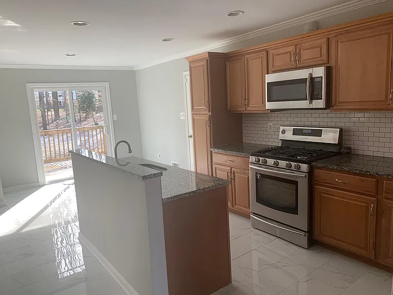 Kitchen with cabinets and Burner/Oven