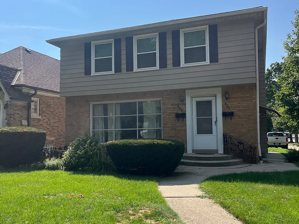 301 E Warnimont Ave