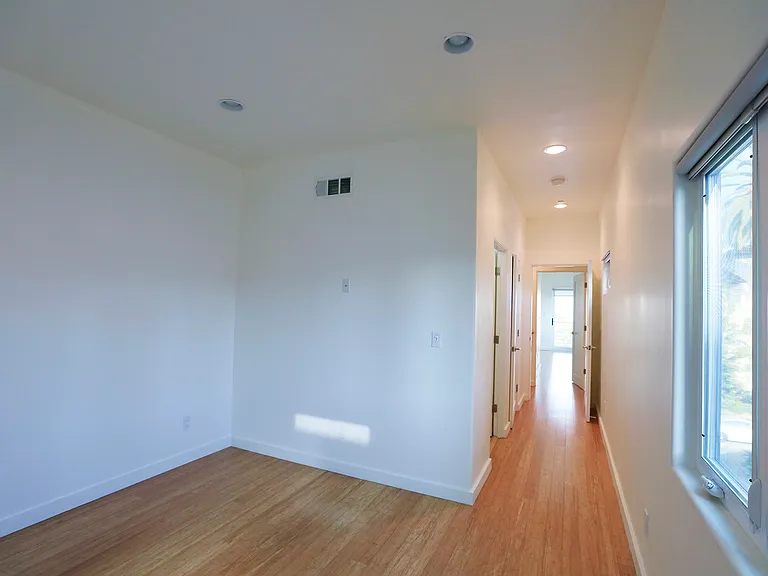 Rear Bedroom and Hallway