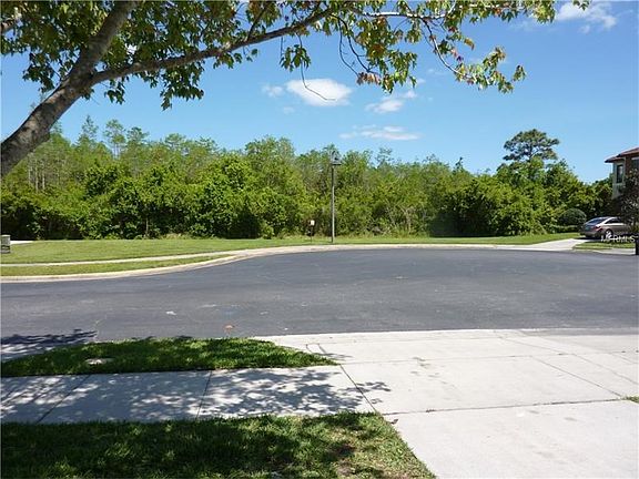 Tranquil wooded view from the front and back. Located on quiet cul de sac.