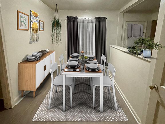 Dining Room with gray laminate flooring
