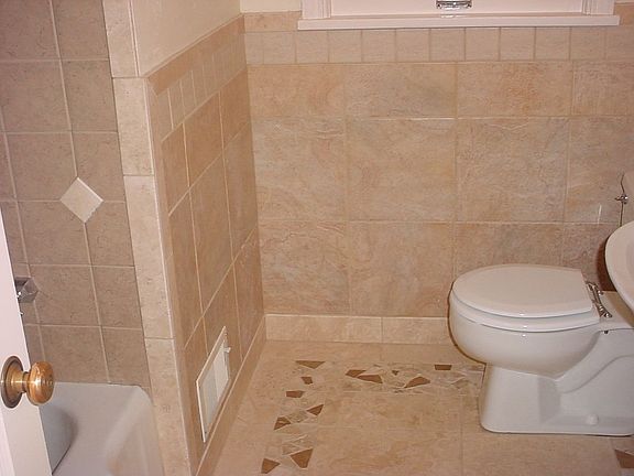 Unbelievable tile work in bathrooms, kitchen and entry!