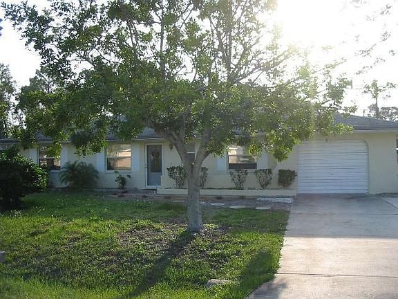 Front of house before Wilma took out the tree