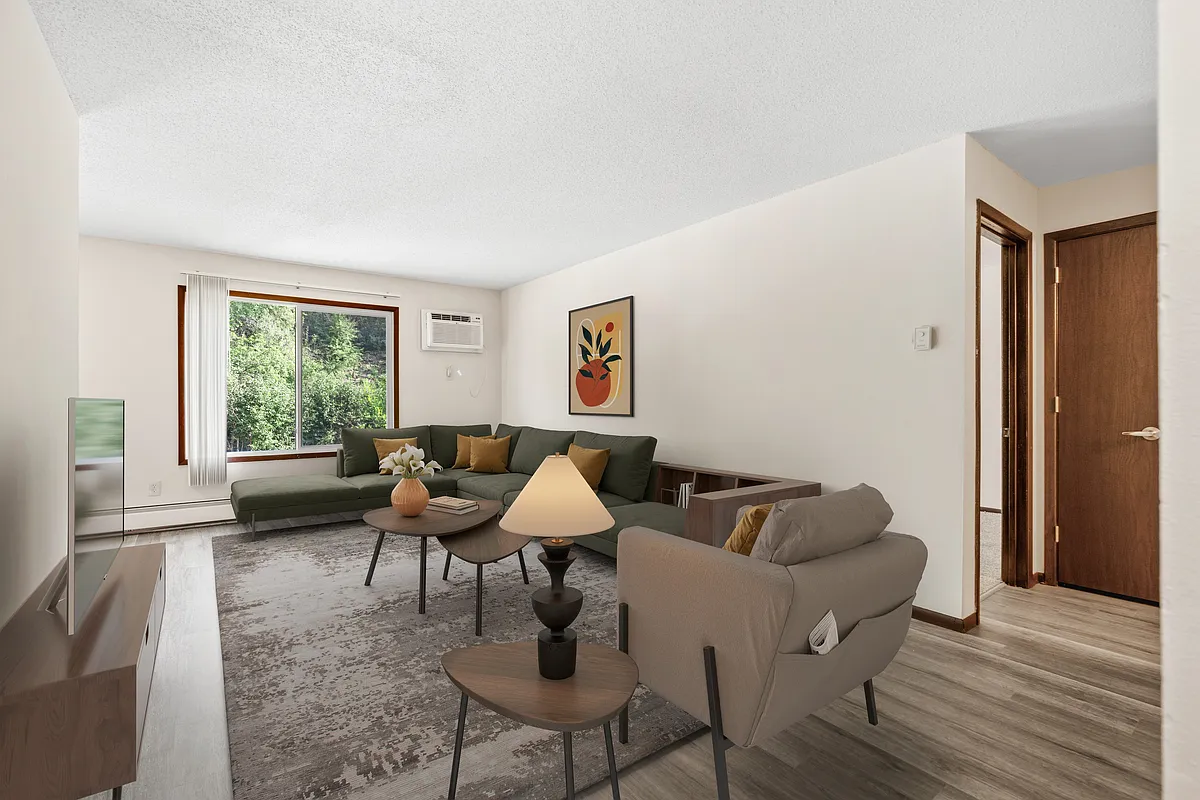 Step into the inviting comfort of Como Park Apartments. Featuring spacious living areas, modern design, and abundant natural light, this home is perfect for relaxation and social gatherings. Don't miss your chanceschedule a tour today! - Como Park Apartments