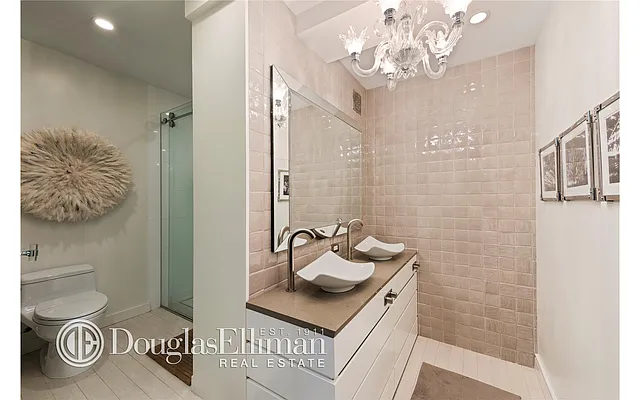 Sold by Douglas Elliman | media 13