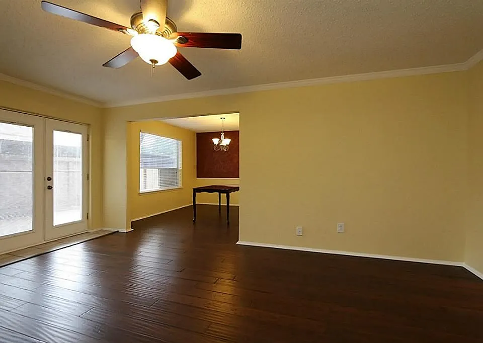 View of the dining room from back of the living room and the