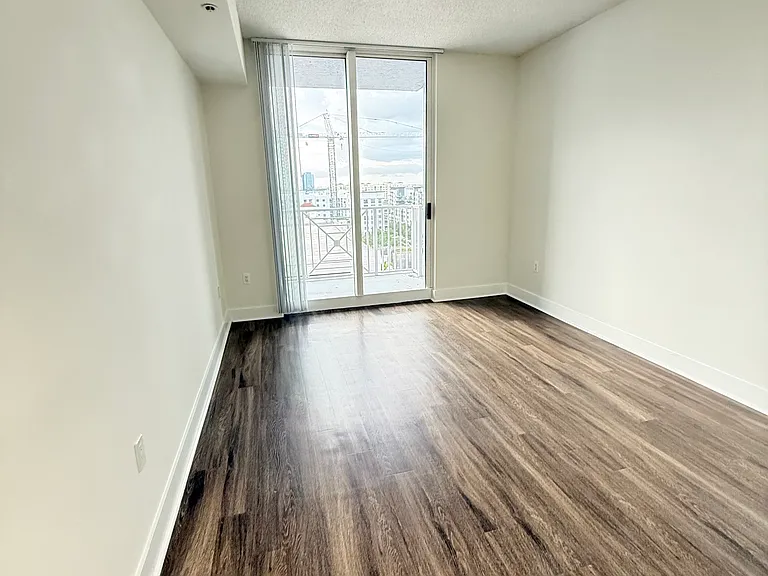 Bedroom with entry to the balcony