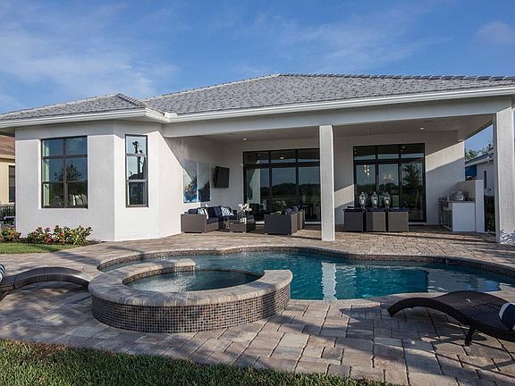 Pool Spa with deck and covered Lanai