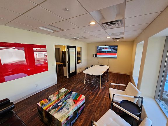 Host meetings in style with natural light, TV connectivity, and creative finishes that energize.