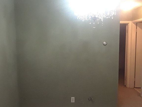 Dining area with chandelier 