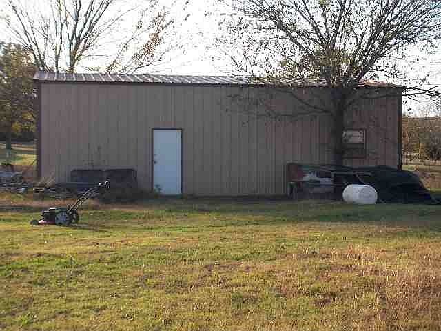 30x40 Shop Building with overhead doors at each end