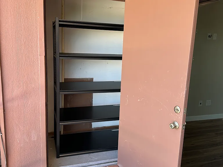 Storage room off the balcony