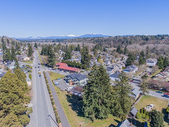 Prime location directly adjacent to the Centennial Trail, offering immediate access to miles of scenic walking and biking paths.