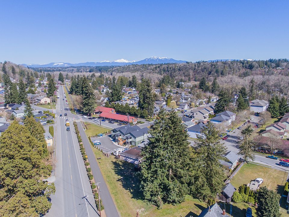 Prime location directly adjacent to the Centennial Trail, offering immediate access to miles of scenic walking and biking paths.