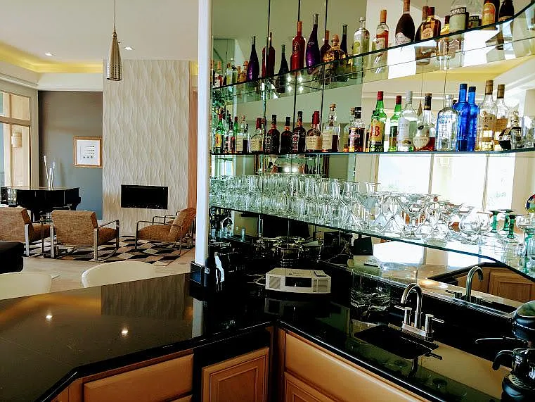 Your own fully stocked bar too? Enjoy! You deserve this!