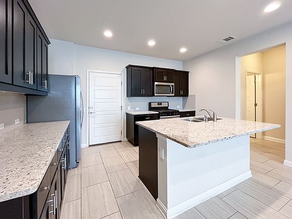 Kitchen with stainless steel appliances included