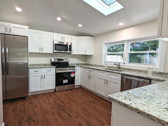 Granite counter tops, lots of cabinets and storage