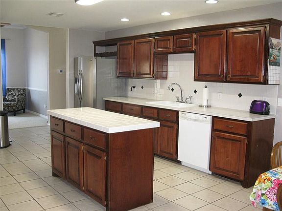 The spacious kitchen makes entertaining and food prep a breeze!  There is plenty of counter top space!