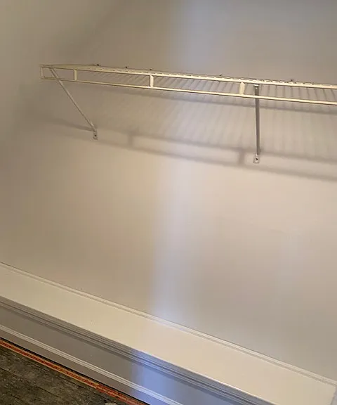 BEDROOM 1 WALK IN CLOSET