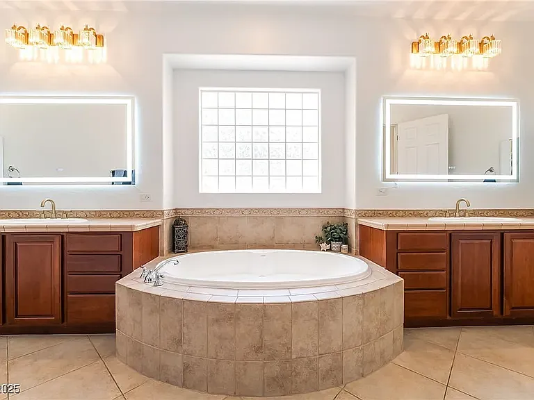 Master bathroom, walk in shower, double sinks and a Jacuzzi tub.