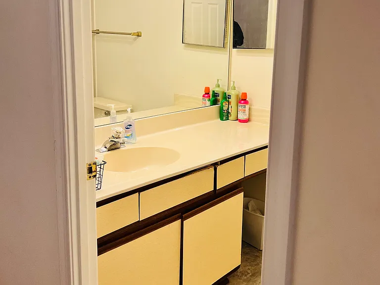 Second full bathroom on top floor with a bathtub