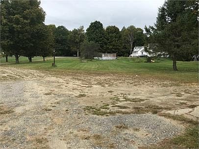 This pic is of the long driveway to get to the home. Nestled in the corner of a wooded backdrop