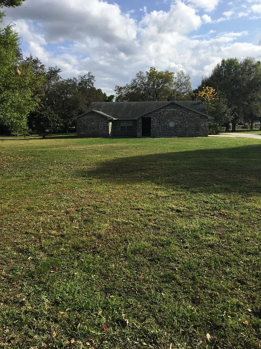 View of Home across Front Lawn - 404 Anderson Dr