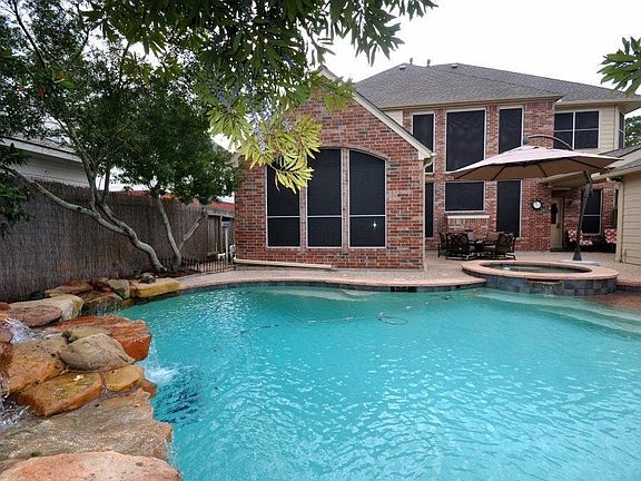 Private backyard oasis awaits you. The seller has installed a pool chiller to keep cool during those hot Texas summers.