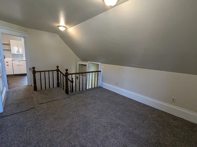 Living room looking into kitchen