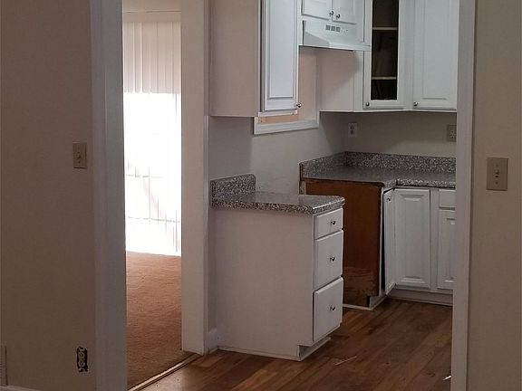 Living room leading to kitchen