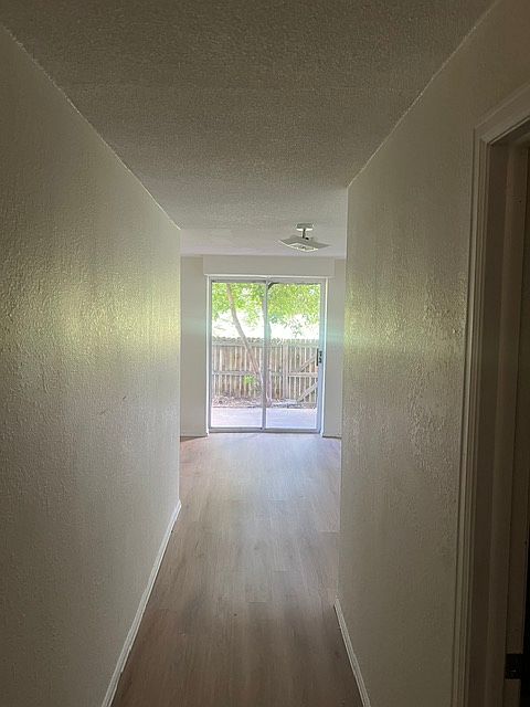 Walkout basement with new flooring and paint