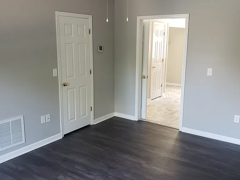 Unit 6 - Living Room Hardwood Floors