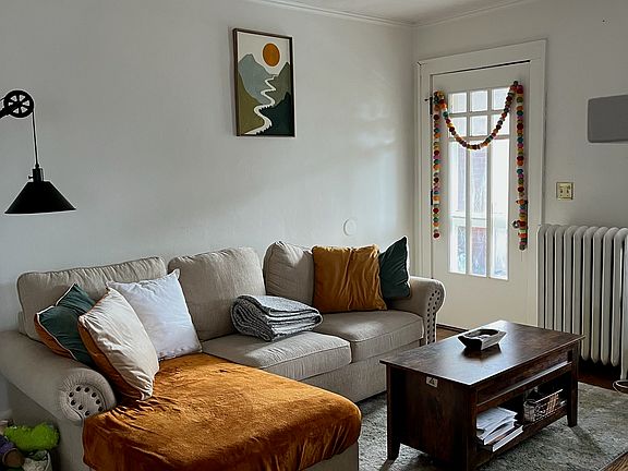 Living Room w/ door leading to the Private Balcony!