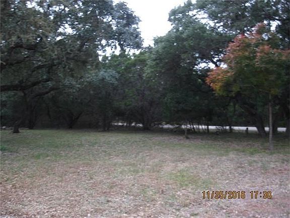 Gently rolling terrain near front of property